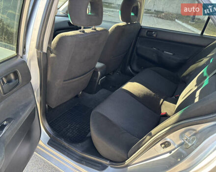 Серый Мицубиси Лансер, объемом двигателя 1.6 л и пробегом 193 тыс. км за 4000 $, фото 9 на Automoto.ua