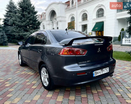 Серый Мицубиси Лансер, объемом двигателя 2 л и пробегом 212 тыс. км за 6000 $, фото 7 на Automoto.ua