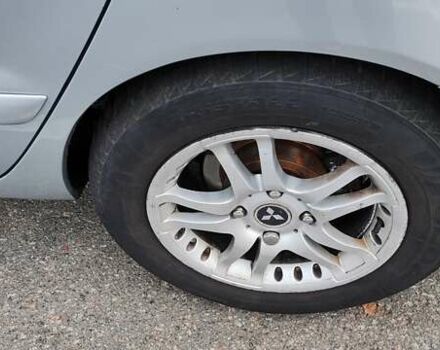 Серый Мицубиси Лансер, объемом двигателя 1.58 л и пробегом 216 тыс. км за 4700 $, фото 12 на Automoto.ua