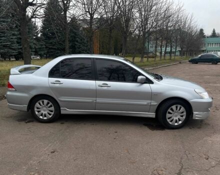 Сірий Міцубісі Lancer, об'ємом двигуна 1.6 л та пробігом 254 тис. км за 3800 $, фото 3 на Automoto.ua
