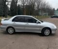 Сірий Міцубісі Lancer, об'ємом двигуна 1.6 л та пробігом 254 тис. км за 3800 $, фото 3 на Automoto.ua