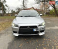 Сірий Міцубісі Lancer, об'ємом двигуна 2 л та пробігом 225 тис. км за 6890 $, фото 1 на Automoto.ua