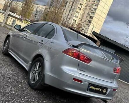 Сірий Міцубісі Lancer, об'ємом двигуна 2 л та пробігом 210 тис. км за 7100 $, фото 4 на Automoto.ua