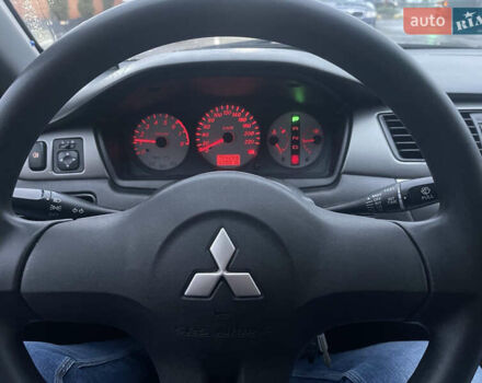 Сірий Міцубісі Lancer, об'ємом двигуна 1.58 л та пробігом 220 тис. км за 5900 $, фото 8 на Automoto.ua