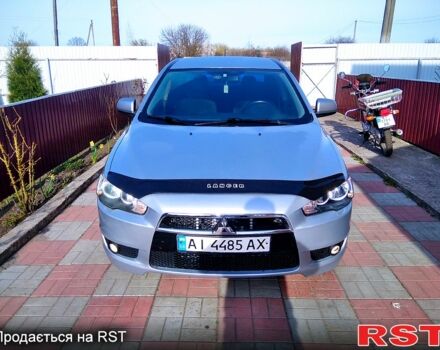 Сірий Міцубісі Lancer, об'ємом двигуна 2 л та пробігом 206 тис. км за 6500 $, фото 6 на Automoto.ua