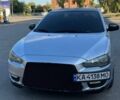 Сірий Міцубісі Lancer, об'ємом двигуна 1.5 л та пробігом 200 тис. км за 4500 $, фото 1 на Automoto.ua