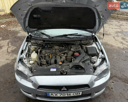 Серый Мицубиси Лансер, объемом двигателя 2 л и пробегом 265 тыс. км за 5200 $, фото 10 на Automoto.ua