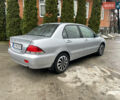 Сірий Міцубісі Lancer, об'ємом двигуна 1.58 л та пробігом 220 тис. км за 5900 $, фото 3 на Automoto.ua
