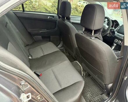 Сірий Міцубісі Lancer, об'ємом двигуна 2 л та пробігом 92 тис. км за 8200 $, фото 35 на Automoto.ua