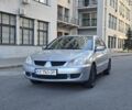 Серый Мицубиси Лансер, объемом двигателя 1.6 л и пробегом 150 тыс. км за 5200 $, фото 1 на Automoto.ua