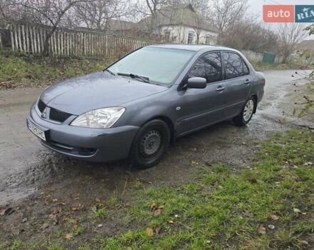 Сірий Міцубісі Lancer, об'ємом двигуна 1.58 л та пробігом 298 тис. км за 3400 $, фото 2 на Automoto.ua