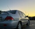 Сірий Міцубісі Lancer, об'ємом двигуна 1.58 л та пробігом 182 тис. км за 4500 $, фото 1 на Automoto.ua