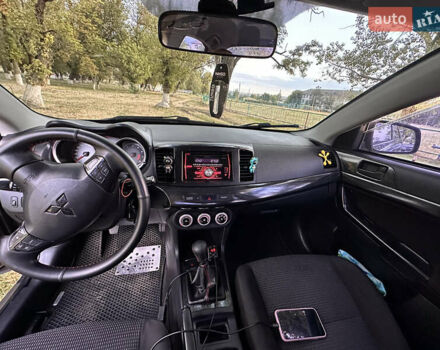 Серый Мицубиси Лансер, объемом двигателя 1.5 л и пробегом 255 тыс. км за 6000 $, фото 10 на Automoto.ua