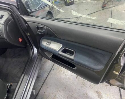 Серый Мицубиси Лансер, объемом двигателя 1.6 л и пробегом 100 тыс. км за 2500 $, фото 5 на Automoto.ua