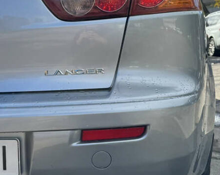 Серый Мицубиси Лансер, объемом двигателя 2 л и пробегом 190 тыс. км за 6900 $, фото 21 на Automoto.ua