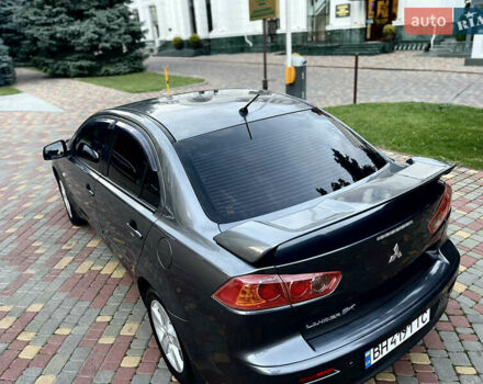 Серый Мицубиси Лансер, объемом двигателя 2 л и пробегом 212 тыс. км за 6000 $, фото 8 на Automoto.ua