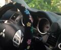 Серый Мицубиси Лансер, объемом двигателя 2 л и пробегом 181 тыс. км за 7499 $, фото 7 на Automoto.ua