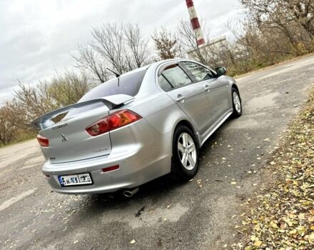 Серый Мицубиси Лансер, объемом двигателя 2 л и пробегом 225 тыс. км за 6890 $, фото 6 на Automoto.ua