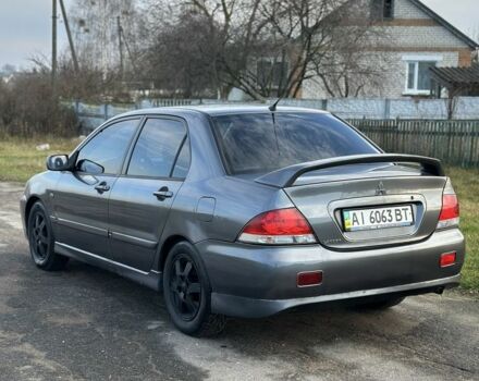 Серый Мицубиси Лансер, объемом двигателя 1.6 л и пробегом 114 тыс. км за 4000 $, фото 5 на Automoto.ua