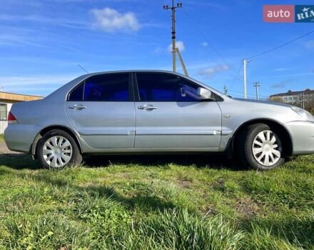 Сірий Міцубісі Lancer, об'ємом двигуна 1.6 л та пробігом 364 тис. км за 4300 $, фото 4 на Automoto.ua