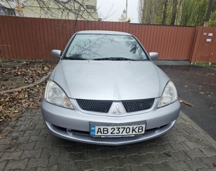 Серый Мицубиси Лансер, объемом двигателя 1.6 л и пробегом 290 тыс. км за 4800 $, фото 2 на Automoto.ua