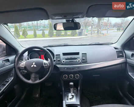 Серый Мицубиси Лансер, объемом двигателя 2 л и пробегом 220 тыс. км за 6500 $, фото 8 на Automoto.ua