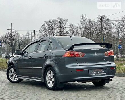 Сірий Міцубісі Lancer, об'ємом двигуна 1.5 л та пробігом 235 тис. км за 6399 $, фото 6 на Automoto.ua