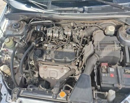 Сірий Міцубісі Lancer, об'ємом двигуна 1.6 л та пробігом 217 тис. км за 6000 $, фото 6 на Automoto.ua
