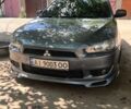 Серый Мицубиси Лансер, объемом двигателя 2 л и пробегом 292 тыс. км за 5599 $, фото 1 на Automoto.ua