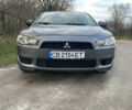 Серый Мицубиси Лансер, объемом двигателя 1.5 л и пробегом 255 тыс. км за 6500 $, фото 6 на Automoto.ua