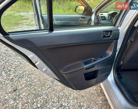 Сірий Міцубісі Lancer, об'ємом двигуна 2 л та пробігом 223 тис. км за 7390 $, фото 14 на Automoto.ua