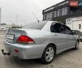 Сірий Міцубісі Lancer, об'ємом двигуна 1.6 л та пробігом 206 тис. км за 4799 $, фото 7 на Automoto.ua