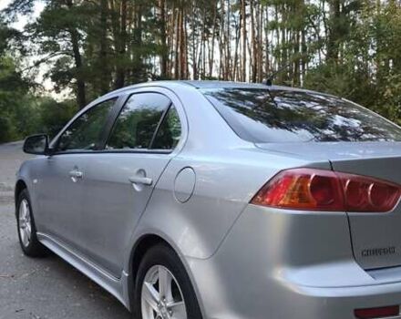 Міцубісі Lancer 2008 у Києві на Automoto.ua Сірий Міцубісі Lancer, об'ємом двигуна 2 л та пробігом 175 тис. км за 8200 $, фото 7 на Automoto.ua