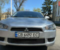 Сірий Міцубісі Lancer, об'ємом двигуна 1.8 л та пробігом 255 тис. км за 6999 $, фото 1 на Automoto.ua