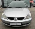 Сірий Міцубісі Lancer, об'ємом двигуна 1.6 л та пробігом 206 тис. км за 4799 $, фото 11 на Automoto.ua