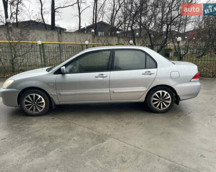 Сірий Міцубісі Lancer, об'ємом двигуна 1.58 л та пробігом 220 тис. км за 5900 $, фото 4 на Automoto.ua