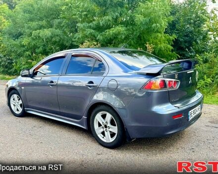 Серый Мицубиси Лансер, объемом двигателя 2 л и пробегом 250 тыс. км за 5800 $, фото 3 на Automoto.ua