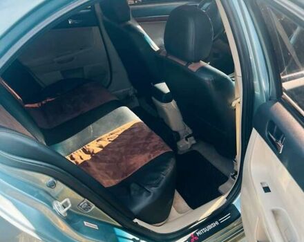 Сірий Міцубісі Lancer, об'ємом двигуна 2 л та пробігом 212 тис. км за 7300 $, фото 5 на Automoto.ua