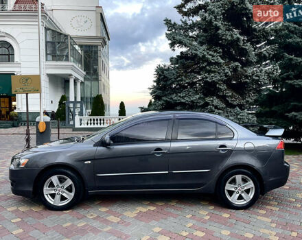 Серый Мицубиси Лансер, объемом двигателя 2 л и пробегом 212 тыс. км за 6000 $, фото 4 на Automoto.ua