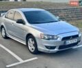 Серый Мицубиси Лансер, объемом двигателя 2 л и пробегом 253 тыс. км за 3800 $, фото 1 на Automoto.ua