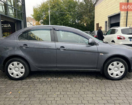 Серый Мицубиси Лансер, объемом двигателя 1.5 л и пробегом 239 тыс. км за 6000 $, фото 4 на Automoto.ua