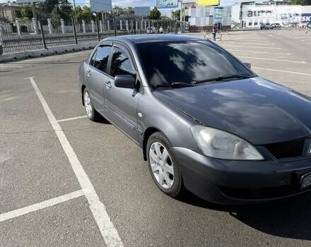 Сірий Міцубісі Lancer, об'ємом двигуна 1.6 л та пробігом 244 тис. км за 3800 $, фото 8 на Automoto.ua