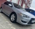 Серый Мицубиси Лансер, объемом двигателя 1.5 л и пробегом 237 тыс. км за 4500 $, фото 1 на Automoto.ua
