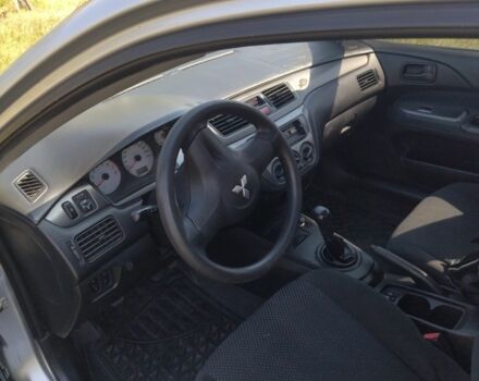 Серый Мицубиси Лансер, объемом двигателя 1.6 л и пробегом 350 тыс. км за 3600 $, фото 2 на Automoto.ua