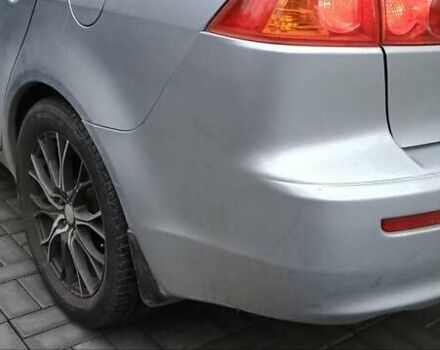 Серый Мицубиси Лансер, объемом двигателя 1.5 л и пробегом 230 тыс. км за 6300 $, фото 5 на Automoto.ua