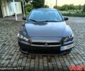 Серый Мицубиси Лансер, объемом двигателя 1.5 л и пробегом 185 тыс. км за 5500 $, фото 1 на Automoto.ua