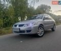 Серый Мицубиси Лансер, объемом двигателя 1.6 л и пробегом 216 тыс. км за 4900 $, фото 18 на Automoto.ua