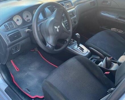 Серый Мицубиси Лансер, объемом двигателя 1.6 л и пробегом 242 тыс. км за 4500 $, фото 6 на Automoto.ua