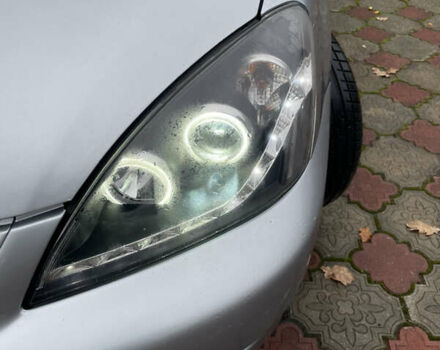 Сірий Міцубісі Lancer, об'ємом двигуна 1.59 л та пробігом 219 тис. км за 4500 $, фото 11 на Automoto.ua