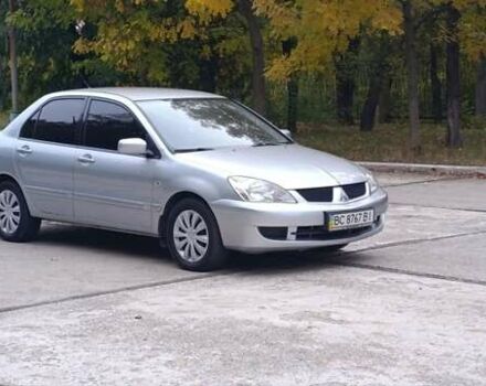 Сірий Міцубісі Lancer, об'ємом двигуна 1.6 л та пробігом 176 тис. км за 4999 $, фото 17 на Automoto.ua